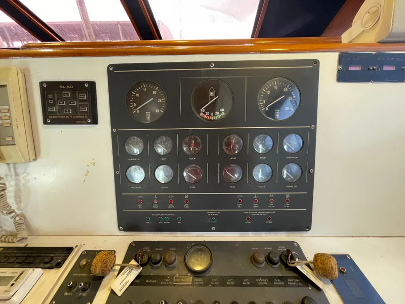 Slide: The Image of Control panel of a 1990 Tiara Yachts 4300 Convertible boat. - 32