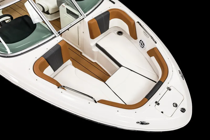 Slide: The Image of 2025 Chaparral 21 SSi IO boat interior with white and brown seating. - 12