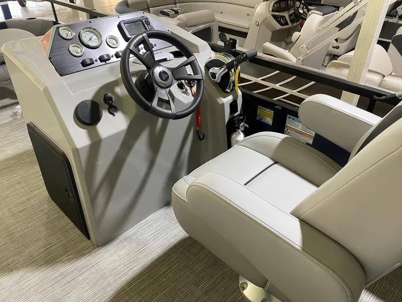 Slide: The Image of Captain's seat and helm of 2022 Viaggio Del Mar 18 Fish boat, featuring modern controls. - 10