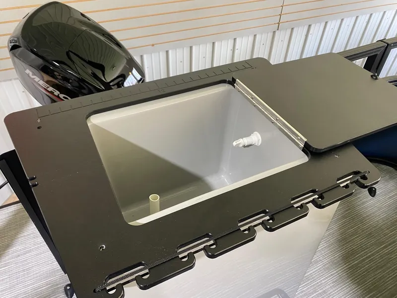 Slide: The Image of Livewell on 2022 Viaggio Del Mar 18 Fish boat with Mercury engine in background. - 11