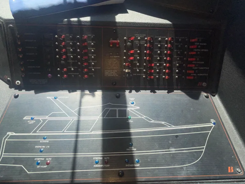 Slide: The Image of Control panel of a 1992 Bayliner 4588 Pilothouse boat with schematic diagram. - 17