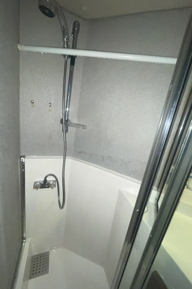 Slide: The Image of Shower area in 1992 Bayliner 4588 Pilothouse yacht, featuring modern fixtures. - 29