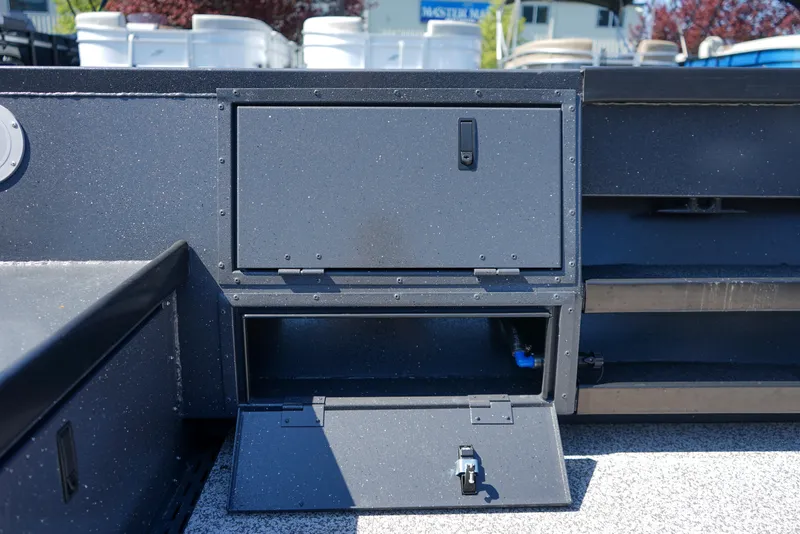 Slide: The Image of 2025 Alumaweld Columbia 23 boat storage compartments, open and closed, showcasing interior space. - 12