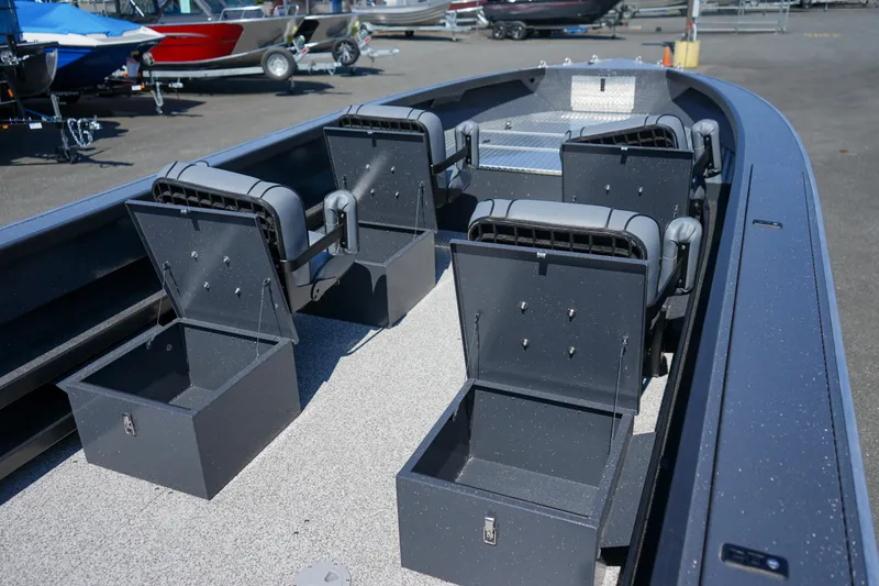 Slide: The Image of 2025 Alumaweld Columbia 23 boat interior with open storage compartments. - 15