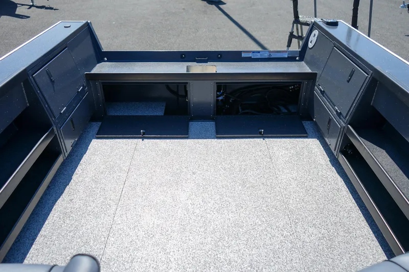Slide: The Image of 2025 Alumaweld Columbia 23 boat interior with spacious storage compartments. - 7