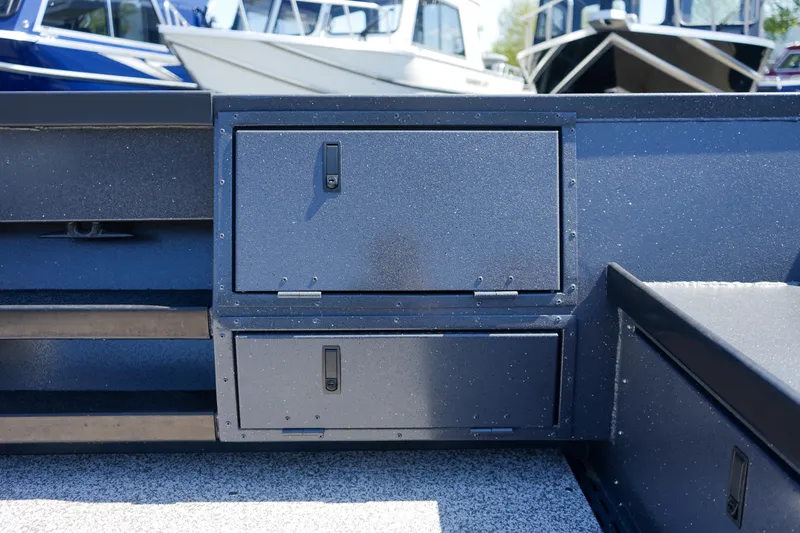 Slide: The Image of 2025 Alumaweld Columbia 23 boat storage compartments, featuring durable construction and sleek design. - 8