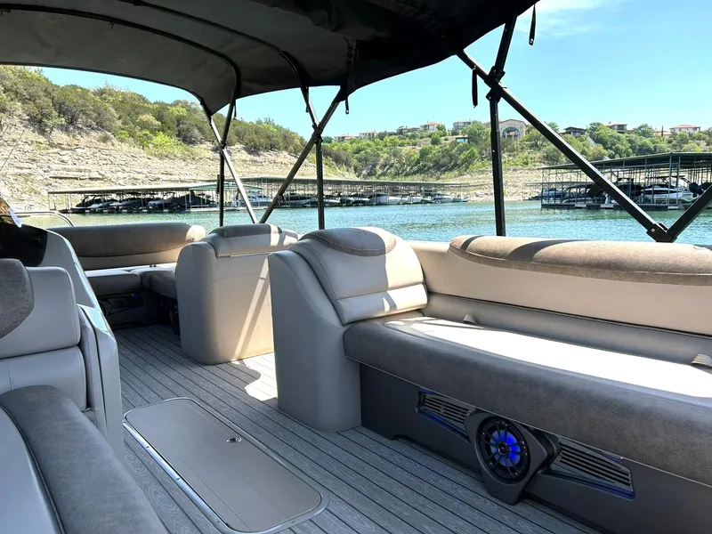 Slide: The Image of 2020 Avalon Catalina 2585 VRB pontoon boat interior with lake view and comfortable seating. - 26