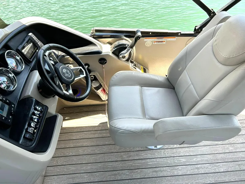 Slide: The Image of 2020 Avalon Catalina 2585 VRB boat interior with steering wheel and captain's chair. - 36