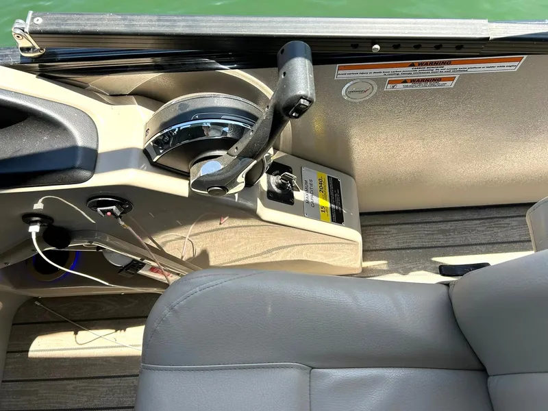 Slide: The Image of Control panel of 2020 Avalon Catalina 2585 VRB boat with throttle and seat. - 39