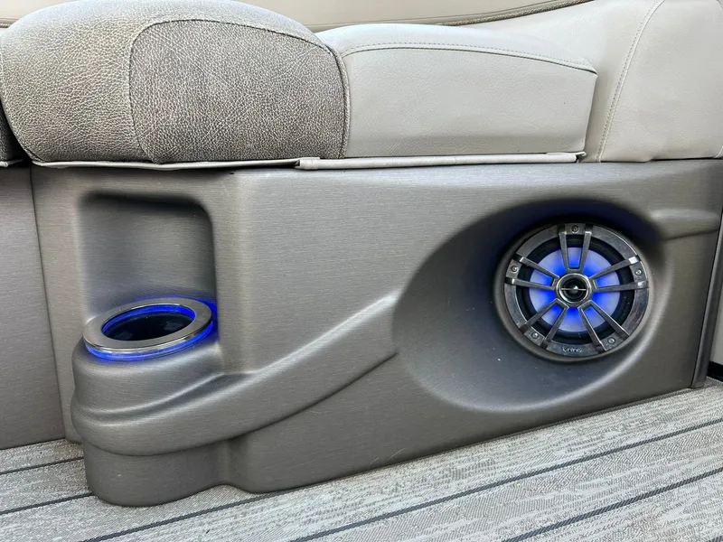 Slide: The Image of 2020 Avalon Catalina 2585 VRB boat interior with speaker and illuminated cup holder. - 43