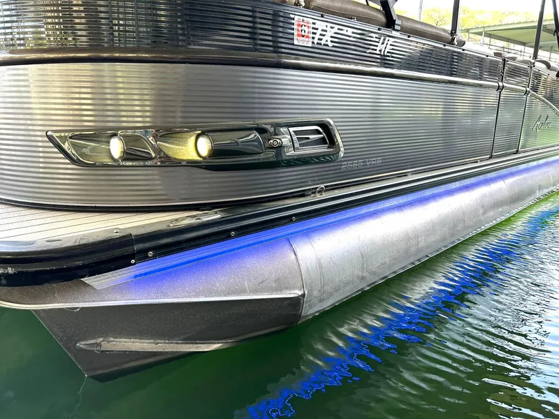Slide: The Image of 2020 Avalon Catalina 2585 VRB pontoon boat with sleek design and blue LED lighting. - 46