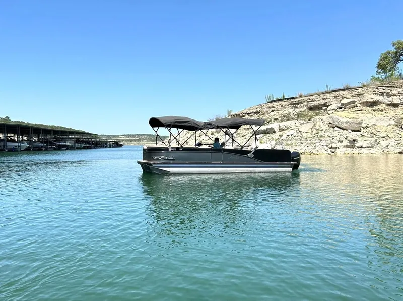Slide: The Image of 2020 Avalon Catalina 2585 VRB pontoon boat on a serene lake. - 7
