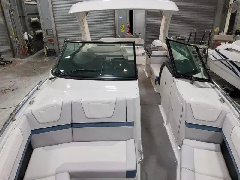 Slide: The Image of 2021 Formula 350 Crossover Bowrider I/O interior with spacious seating and sleek design. - 16