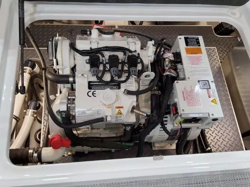 Slide: The Image of Engine compartment of a 2021 Formula 350 Crossover Bowrider I/O boat. - 21