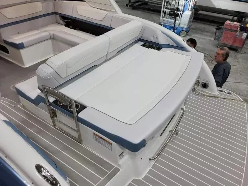 Slide: The Image of 2021 Formula 350 Crossover Bowrider I/O interior with spacious seating and swim platform. - 7