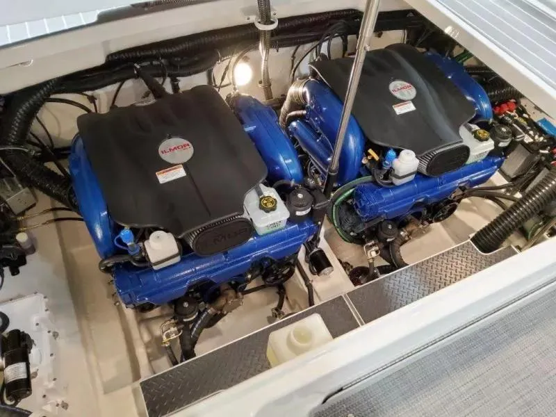 Slide: The Image of Twin engines in a 2021 Formula 350 Crossover Bowrider I/O boat. - 9