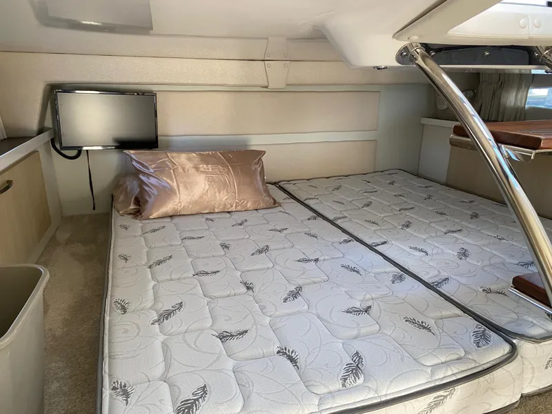 Slide: The Image of 2023 Regal 33 Express boat cockpit with steering wheel and modern controls. - 13