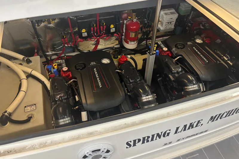 Slide: The Image of Engine compartment of 2023 Regal 33 Express boat with Volvo Penta engines. - 34