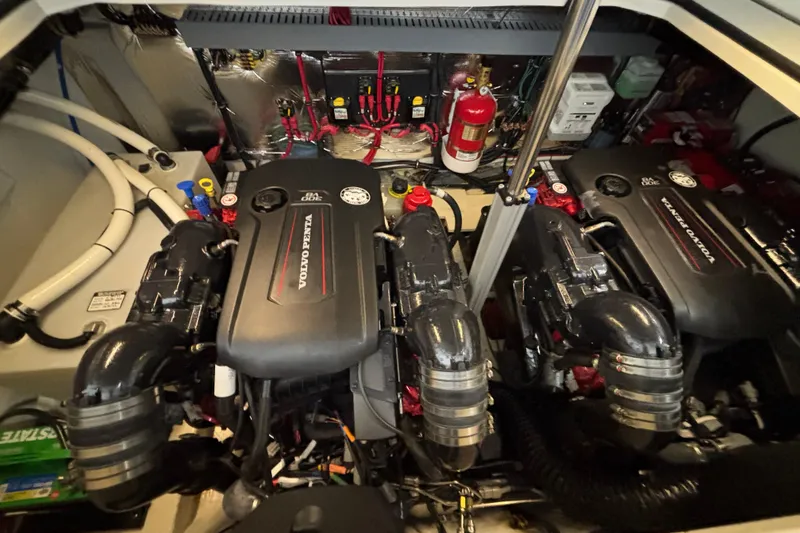 Slide: The Image of Engine room of 2023 Regal 33 Express with dual Volvo Penta engines. - 35