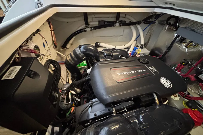 Slide: The Image of Engine compartment of 2023 Regal 33 Express with Volvo Penta engine. - 38