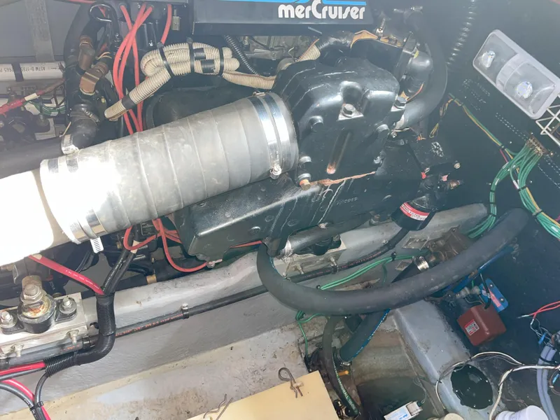 Slide: The Image of Engine compartment of a 1990 Sea Ray 390 Express Cruiser with MerCruiser components. - 39
