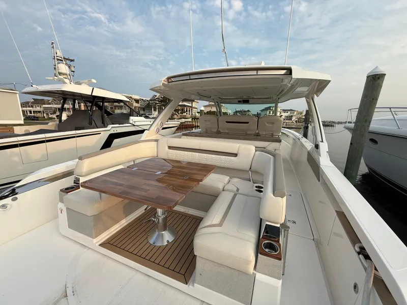 Slide: The Image of 2023 Tiara Yachts 43 LS luxury boat with spacious seating and elegant design. - 27