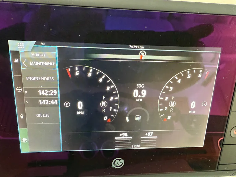 Slide: The Image of Dashboard display of 2023 Tiara Yachts 43 LS showing engine hours and speed. - 37