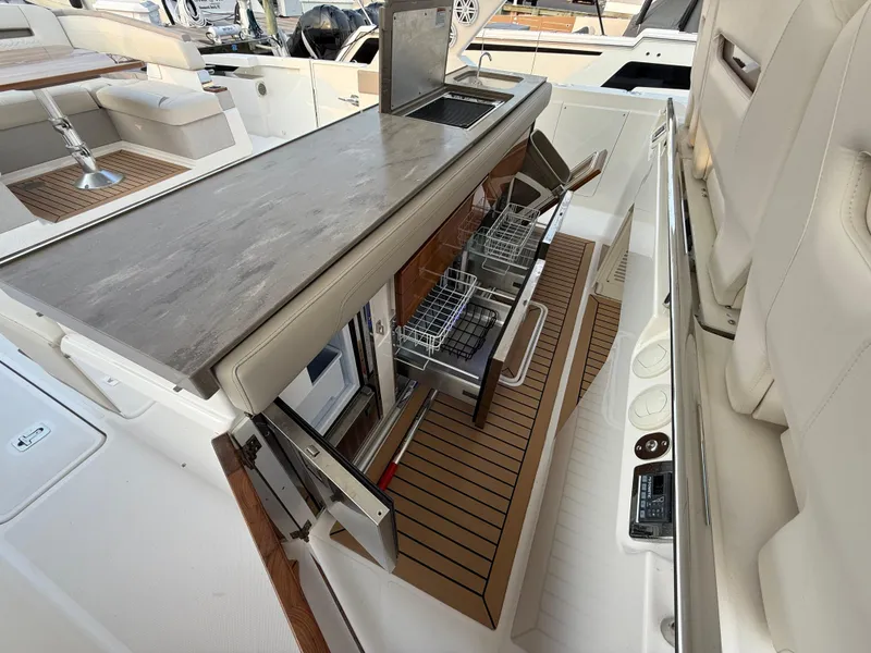 Slide: The Image of 2023 Tiara Yachts 43 LS interior with sleek kitchen and modern amenities. - 39
