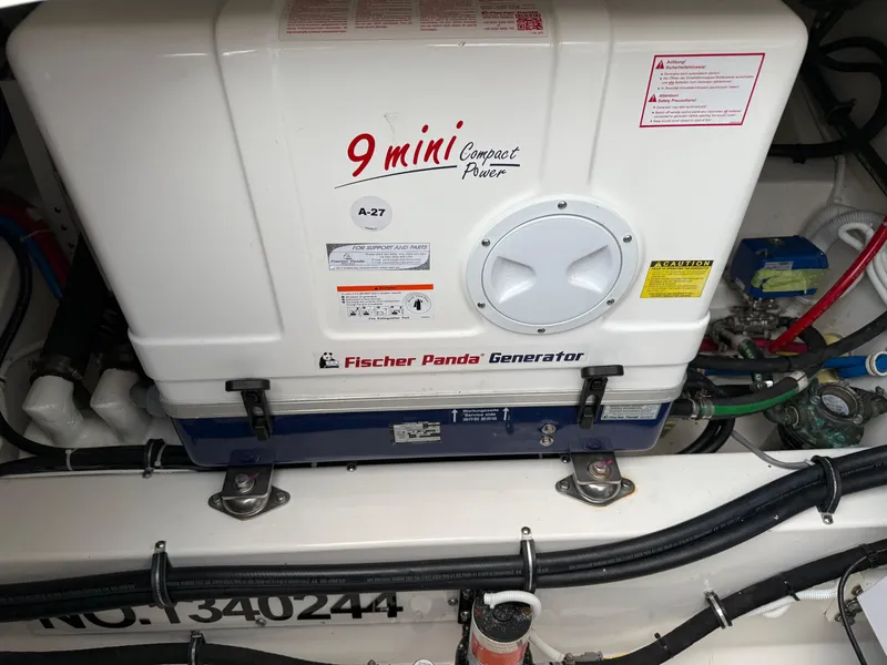 Slide: The Image of Fischer Panda generator in 2023 Tiara Yachts 43 LS engine room. - 57