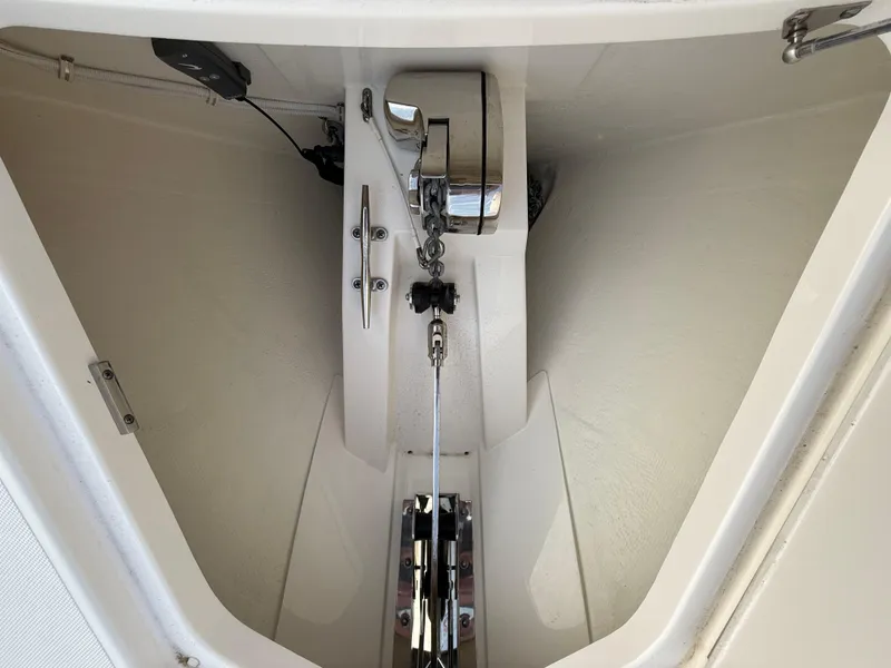 Slide: The Image of Anchor compartment of 2023 Tiara Yachts 43 LS, featuring a sleek, modern design. - 61