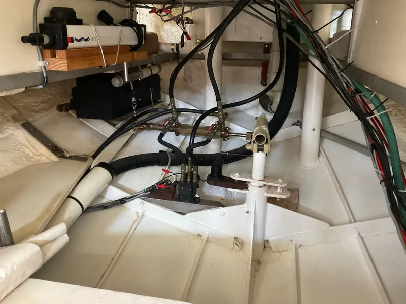 Slide: The Image of Interior view of 1980 Kanter Staysail Cutter's mechanical components and wiring. - 20