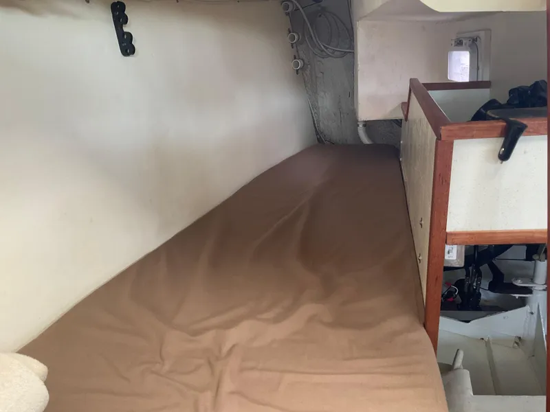 Slide: The Image of Interior of 1980 Kanter Staysail Cutter with a cozy sleeping berth. - 22