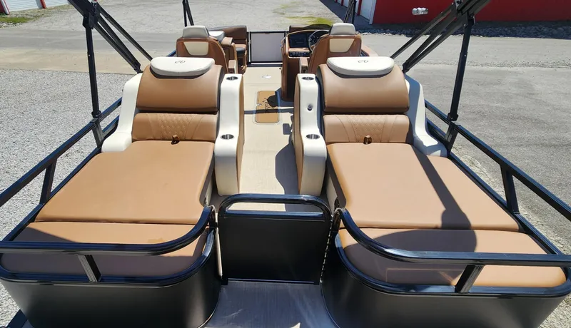 Slide: The Image of 2024 Avalon LSZ 2385 Rear Lounger with tan seating and spacious layout. - 10