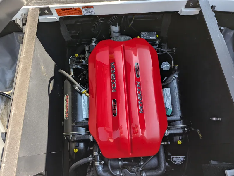Slide: The Image of 2019 Axis A22 engine compartment with red Monsoon engine cover. - 16