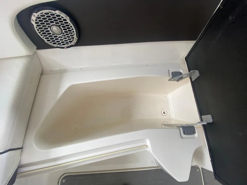 Slide: The Image of 2017 Sea Ray 270 SDX OB storage compartment with speaker, featuring sleek design and functionality. - 33