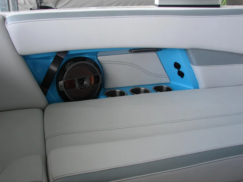 Slide: The Image of Interior of 2021 MasterCraft XStar boat with speaker and cup holders. - 13