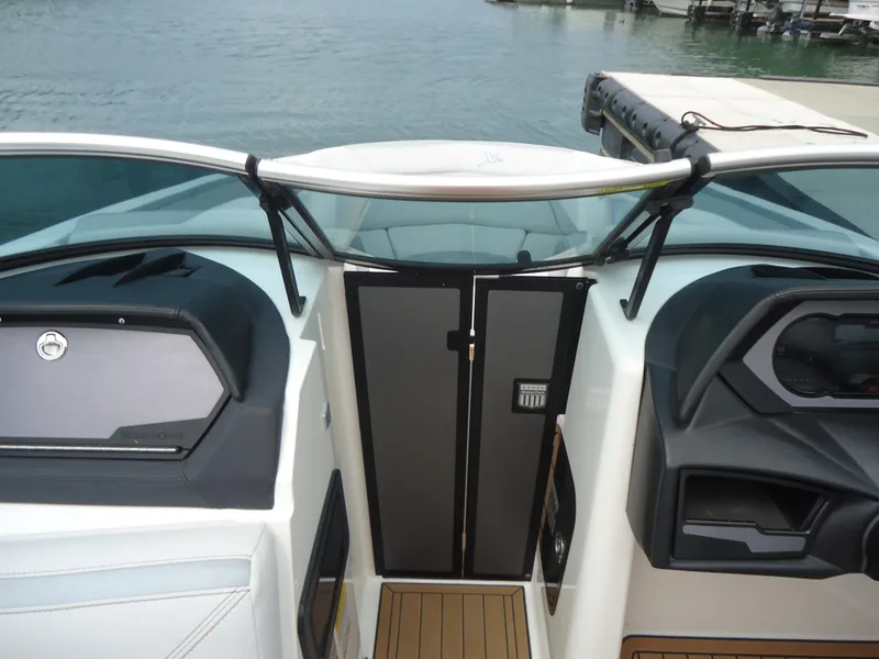 Slide: The Image of 2021 MasterCraft XStar boat interior with sleek dashboard and modern design. - 9