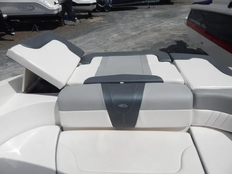 Slide: The Image of 2021 Chaparral 23 SSi boat with sleek, modern seating design. - 15