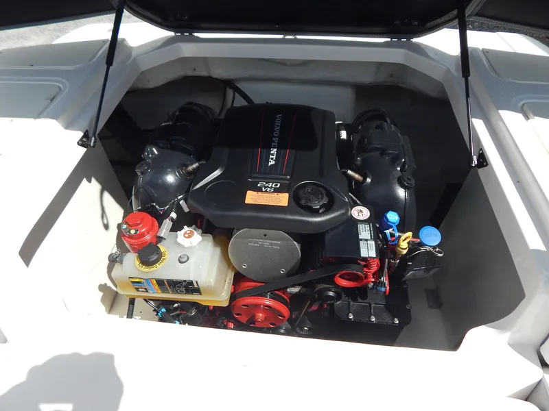 Slide: The Image of 2021 Chaparral 23 SSi boat engine compartment with Volvo Penta engine. - 19