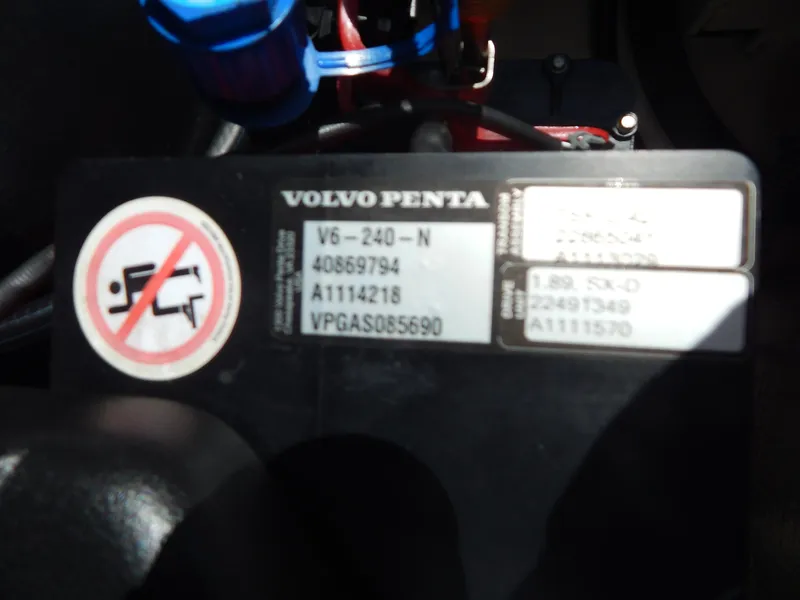 Slide: The Image of Volvo Penta engine label on 2021 Chaparral 23 SSi boat, showing model and serial numbers. - 21