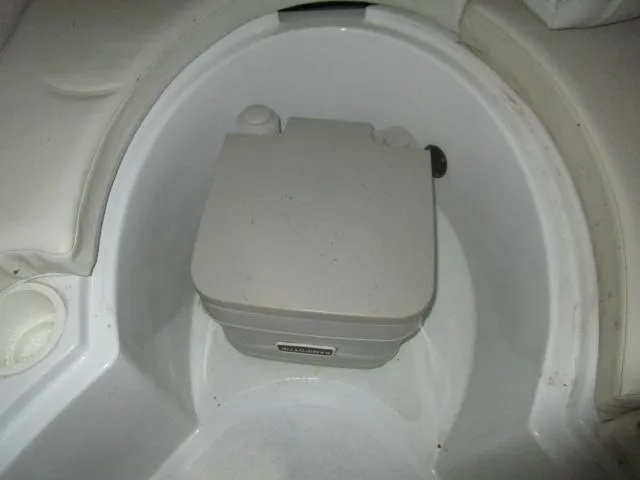 Slide: The Image of Portable toilet in 2001 Baja 292 Islander boat interior. - 15