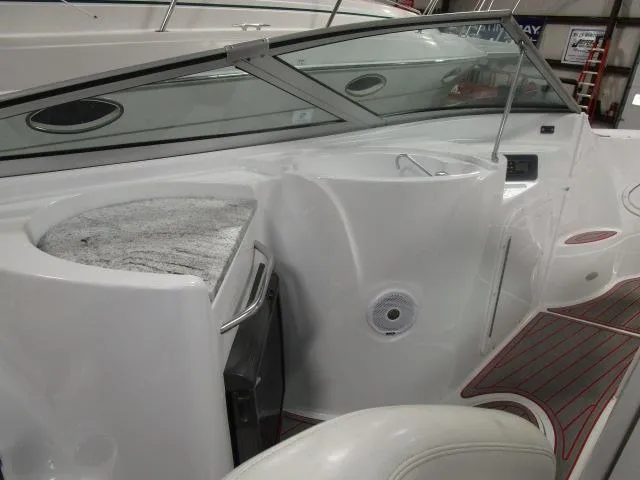 Slide: The Image of 2001 Baja 292 Islander boat interior with seating and windshield. - 6