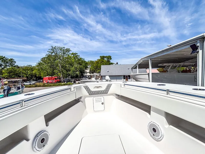 Slide: The Image of 2022 Invincible 36 Open Fisherman boat, spacious deck, clear sky, outdoor setting. - 13