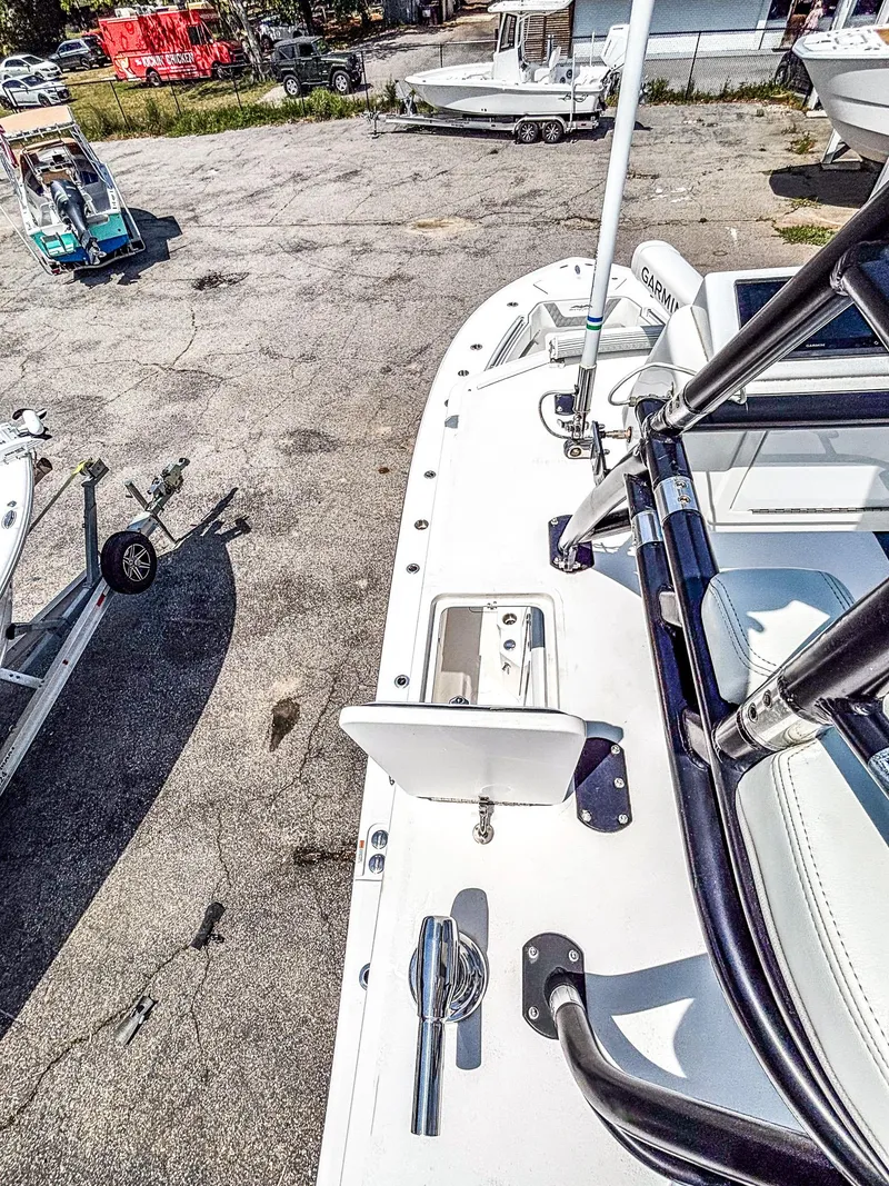 Slide: The Image of 2022 Invincible 36 Open Fisherman boat on display in a marina setting. - 16