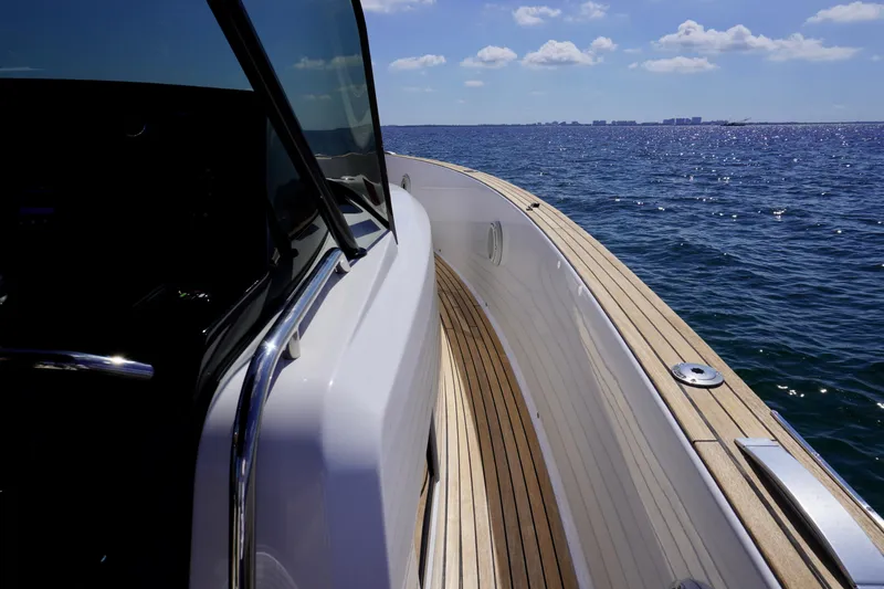 Slide: The Image of 2020 Pardo Yachts 38 cruising on open sea with clear skies. - 12