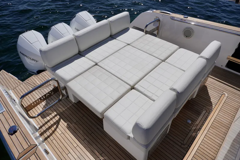 Slide: The Image of Luxurious seating area on 2020 Pardo Yachts 38, featuring white cushioned layout. - 22