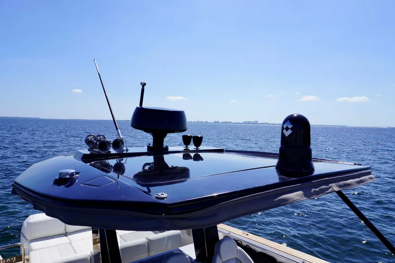 Slide: The Image of 2020 Pardo Yachts 38 on open water, featuring sleek black roof and modern equipment. - 23