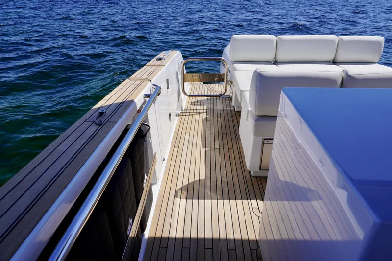 Slide: The Image of 2020 Pardo Yachts 38 deck with white seating, overlooking the ocean. - 25