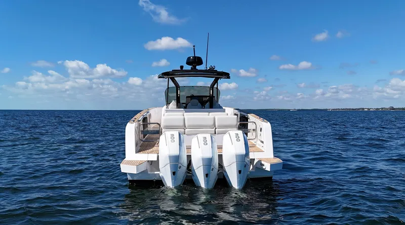 Slide: The Image of 2020 Pardo Yachts 38 with triple outboard engines on open water. - 3