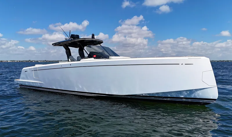 Slide: The Image of 2020 Pardo Yachts 38 cruising on open water under a clear blue sky. - 5